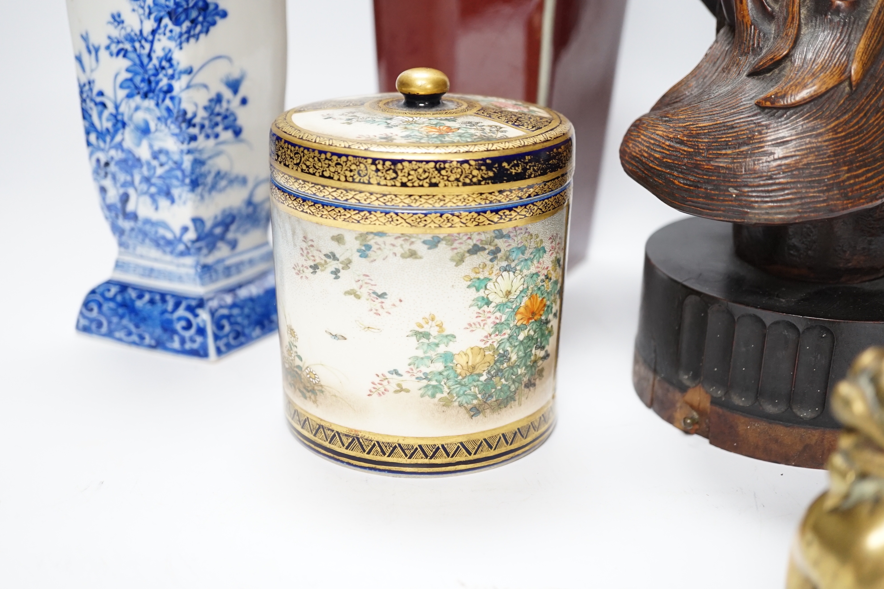 A Chinese sang-de-boeuf vase, a hongmu head, a Japanese Satsuma jar, a blue and white vase, and a turquoise and cream glazed vase etc, tallest sang-de-boeuf vase 25.5 cm high